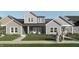 Two-story townhouses with gray and beige siding at 3931 Willow Gate Way, Raleigh, NC 27604