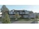Modern three-unit building with gray siding and dark roofs at 3931 Willow Gate Way, Raleigh, NC 27604