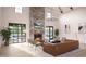 Spacious living room with fireplace and large windows at 2049 Abbeyhill Dr, Raleigh, NC 27610