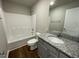 Bathroom with granite vanity and a tub shower combo at 114 Scotties Ridge Dr, Princeton, NC 27569