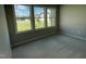 Bedroom with three windows and neutral carpeting at 114 Scotties Ridge Dr, Princeton, NC 27569