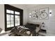 Modern bedroom with large windows and stylish decor at 3709 Joyful Creek Trl, Zebulon, NC 27597