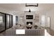 Spacious living room features a modern fireplace and ample natural light at 3709 Joyful Creek Trl, Zebulon, NC 27597