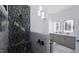 Spa-like bathroom with a walk-in shower and double vanity at 3709 Joyful Creek Trl, Zebulon, NC 27597