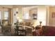 Living room features a comfortable sofa and a view into the kitchen at 3331 Lazy Ln, Graham, NC 27253
