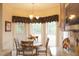 Charming kitchen breakfast nook with a bay window at 3331 Lazy Ln, Graham, NC 27253