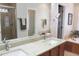 Elegant bathroom with double vanity, granite countertop, and a large soaking tub at 3331 Lazy Ln, Graham, NC 27253