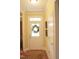 Bright entryway with hardwood floors and a charming wreath at 3331 Lazy Ln, Graham, NC 27253