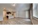 Open concept living room and kitchen area with hardwood flooring at 3635 Water Mist Ln, Raleigh, NC 27604