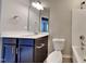 Clean bathroom with single vanity and bathtub at 3635 Water Mist Ln, Raleigh, NC 27604