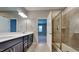 Modern bathroom with double vanity and walk-in shower at 3635 Water Mist Ln, Raleigh, NC 27604