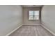 Bright bedroom featuring neutral walls and carpet at 3635 Water Mist Ln, Raleigh, NC 27604