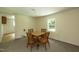 Small dining area with table and chairs, view of kitchen at 510 Pleasant Dr, Durham, NC 27703