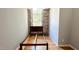 Small bedroom with wood floors and stone wall at 1500 River Mill Drive Dr # 110, Wake Forest, NC 27587