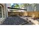 Small backyard with wood fence and garden at 1500 River Mill Drive Dr # 110, Wake Forest, NC 27587