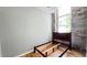 Simple bedroom with hardwood floors and large window at 1500 River Mill Drive Dr # 110, Wake Forest, NC 27587