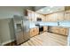 Modern kitchen with stainless steel appliances and white quartz countertops at 1500 River Mill Drive Dr # 110, Wake Forest, NC 27587