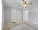 Simple bedroom with closet and ceiling fan at 1510 Logan St, Durham, NC 27704