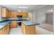 Kitchen with island and stainless steel appliances at 1510 Logan St, Durham, NC 27704