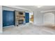 Living room featuring a stone fireplace and open floor plan at 1510 Logan St, Durham, NC 27704
