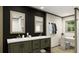 Modern bathroom with double sinks and a large shower at 369 Sombrero Ln, Henderson, NC 27537