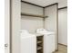 Laundry room with washer, dryer, and shelving at 369 Sombrero Ln, Henderson, NC 27537