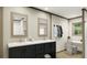 Elegant bathroom, featuring double sinks and a shower at 369 Sombrero Ln, Henderson, NC 27537