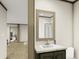 Clean bathroom with vanity, mirror, and shower at 369 Sombrero Ln, Henderson, NC 27537