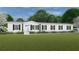 Single-story home with white siding and black accents at 369 Sombrero Ln, Henderson, NC 27537