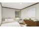 Bright bedroom with a queen bed and dresser at 369 Sombrero Ln, Henderson, NC 27537