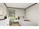 Cozy bedroom featuring a twin bed and white dresser at 369 Sombrero Ln, Henderson, NC 27537