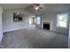 Spacious living room featuring a fireplace and vaulted ceiling at 78 Grace Ridge Ct, Benson, NC 27504