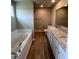 Double vanity bathroom with soaking tub and separate shower at 78 Grace Ridge Ct, Benson, NC 27504