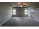 Large main bedroom with plush carpeting and en-suite bathroom at 78 Grace Ridge Ct, Benson, NC 27504