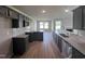 Modern kitchen with granite countertops and stainless steel appliances at 78 Grace Ridge Ct, Benson, NC 27504