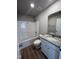 Clean bathroom with a tub, toilet, vanity with granite countertop at 78 Grace Ridge Ct, Benson, NC 27504
