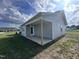 Gray house with a covered porch and a well-maintained lawn at 78 Grace Ridge Ct, Benson, NC 27504