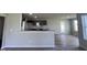 Modern kitchen with granite countertops and stainless steel appliances at 78 Grace Ridge Ct, Benson, NC 27504