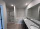 Double vanity bathroom with soaking tub and separate shower at 184 Grace Ridge Ct, Benson, NC 27504