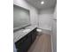 Bathroom features granite countertop, dark vanity, and a bathtub at 184 Grace Ridge Ct, Benson, NC 27504