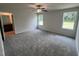 Spacious bedroom with ceiling fan, ample natural light and en-suite bathroom at 184 Grace Ridge Ct, Benson, NC 27504