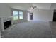 Spacious living room with a fireplace and vaulted ceiling at 184 Grace Ridge Ct, Benson, NC 27504