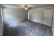Bright bedroom with ceiling fan and plush carpeting at 184 Grace Ridge Ct, Benson, NC 27504