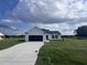 Newly built single story home with attached garage and large yard at 117 Grace Ridge Ct, Benson, NC 27504