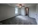 Main bedroom with ceiling fan and private bath access at 117 Grace Ridge Ct, Benson, NC 27504