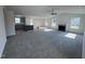 Open concept living room and kitchen area with new flooring at 117 Grace Ridge Ct, Benson, NC 27504