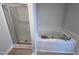 Bathroom with shower and garden tub at 117 Grace Ridge Ct, Benson, NC 27504