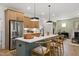 Kitchen island with seating and a sleek, modern design at 226 Beacon Dr, Pittsboro, NC 27312