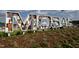 Mosaic community entrance sign with landscaping at 226 Beacon Dr, Pittsboro, NC 27312