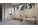 Modern bathroom with a soaking tub and walk-in shower at 5428 Winding View Ln, Raleigh, NC 27615